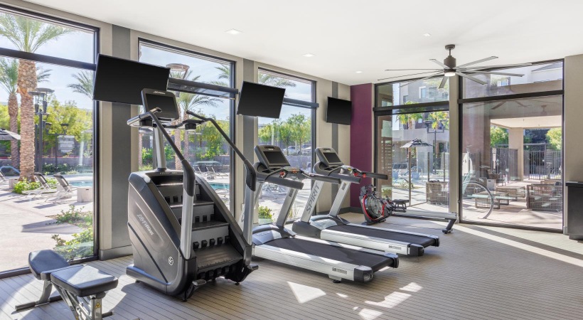 a gym with treadmills